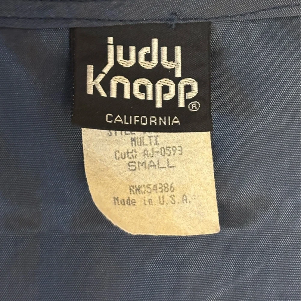 Judy Knapp Vintage vest in various shades of blue by with a printed design SizeS